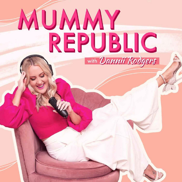 Podcast cover "Mummy Republic with Dannii Rodgers". Dannii is sitting on a pink couch laughing with headphone and a microphone. Dannii has blonde hair, light skin and is wearing a pink shirt with loose fitting white pants.